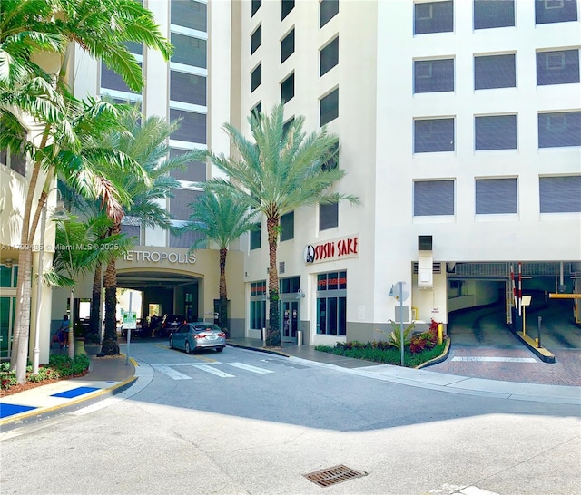 view of property with uncovered parking