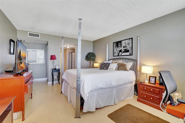 600 Three Islands Blvd Unit 1703, Hallandale Beach, FL 33009 - bedroom with a textured ceiling and baseboards