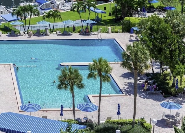 600 Three Islands Blvd Unit 1703, Hallandale Beach, FL 33009 - community pool with fence and a patio area