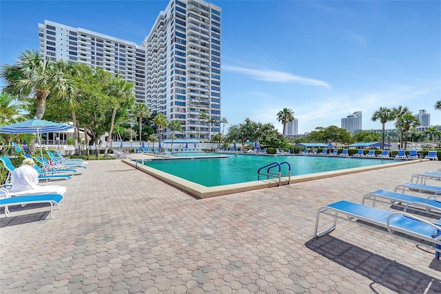 600 Three Islands Blvd Unit 1703, Hallandale Beach, FL 33009 - community pool featuring a patio