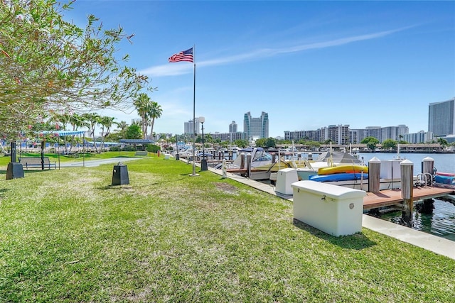 600 Three Islands Blvd Unit 1703, Hallandale Beach, FL 33009 - dock area with a lawn, a water view, and a city view