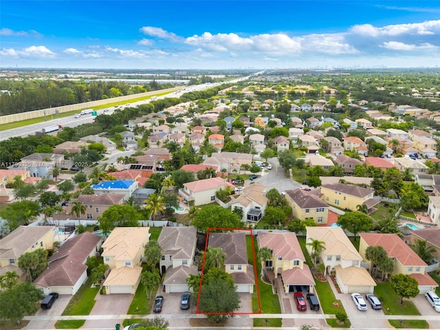 aerial perspective of suburban area with property boundaries highlighted