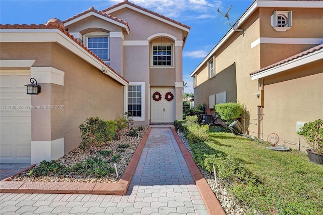5354 NW 119th Ter, Coral Springs, FL 33076 - entrance to property featuring stucco siding and a tile roof