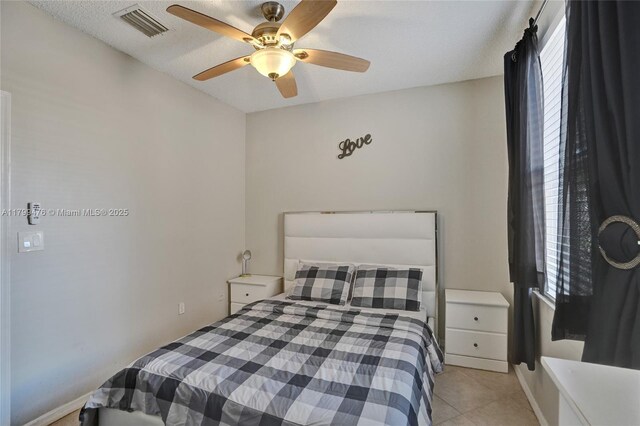 5354 NW 119th Ter, Coral Springs, FL 33076 - bedroom with ceiling fan and light tile patterned floors