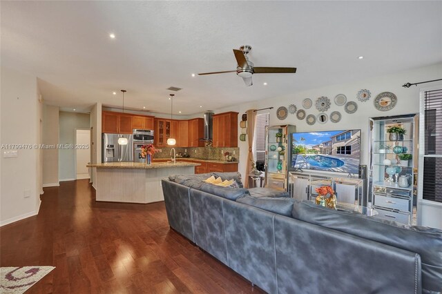 5354 NW 119th Ter, Coral Springs, FL 33076 - living room featuring dark wood-type flooring, ceiling fan, recessed lighting, and baseboards