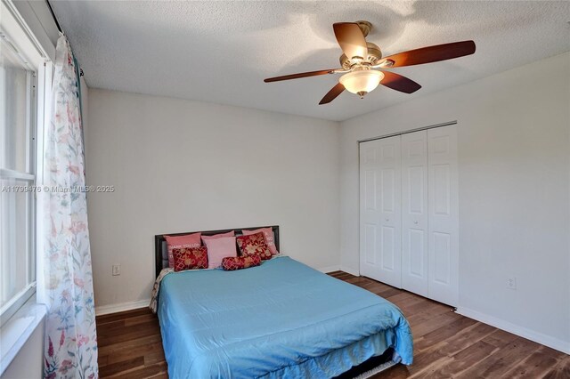 5354 NW 119th Ter, Coral Springs, FL 33076 - bedroom with wood finished floors, ceiling fan, baseboards, a closet, and a textured ceiling