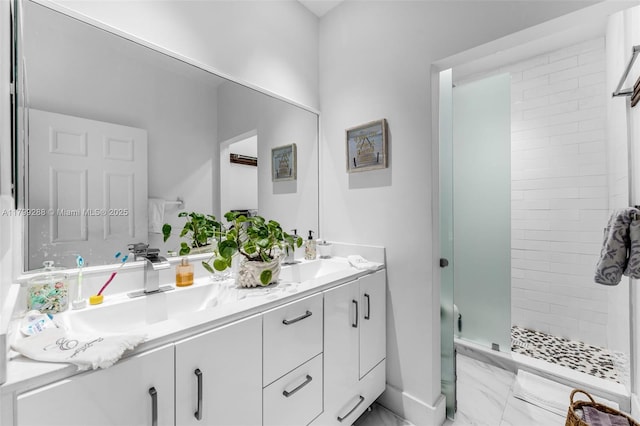 655 SE 37th Ter, Homestead, FL 33033 - full bathroom featuring a shower stall, double vanity, and marble look tile flooring