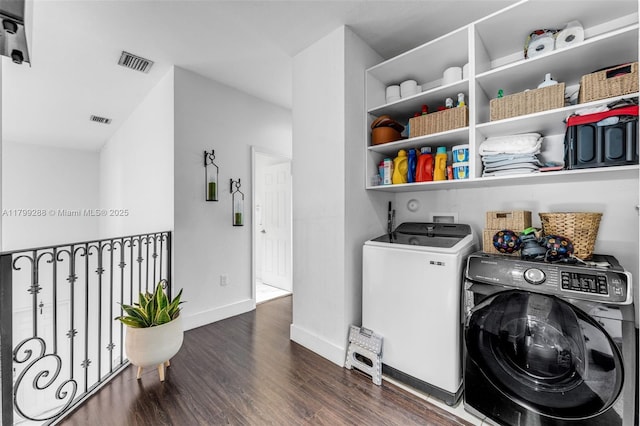655 SE 37th Ter, Homestead, FL 33033 - clothes washing area with washer and clothes dryer, wood finished floors, and baseboards