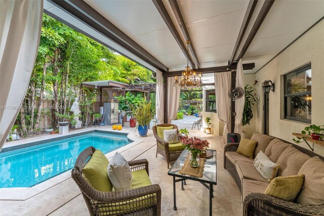 655 SE 37th Ter, Homestead, FL 33033 - view of pool featuring an outdoor living space, a patio, and a fenced backyard