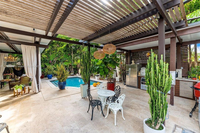 655 SE 37th Ter, Homestead, FL 33033 - view of patio with area for grilling, an outdoor pool, and a pergola