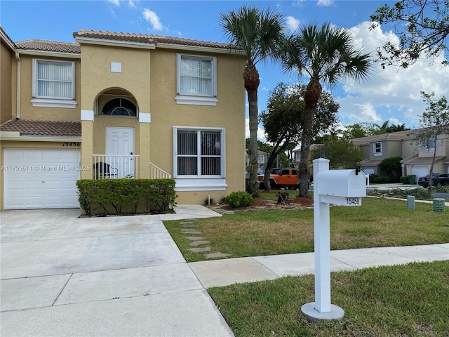 15456 NW 12th Pl, Pembroke Pines, FL 33028 - view of front of house with stucco siding, a garage, a front lawn, concrete driveway, and a tiled roof