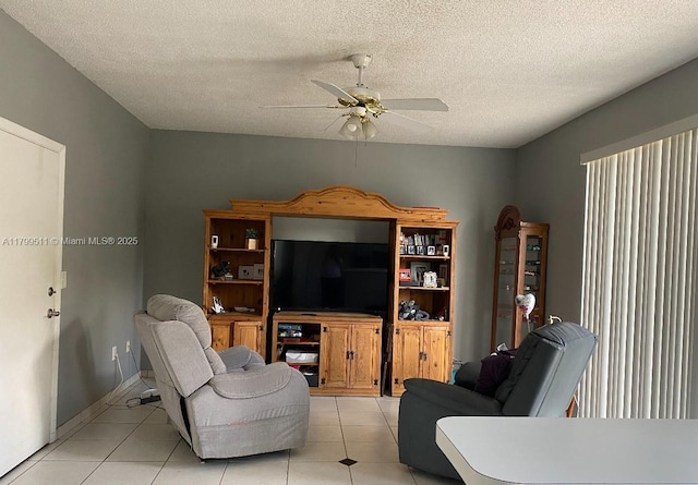 15456 NW 12th Pl, Pembroke Pines, FL 33028 - living area featuring a ceiling fan, a textured ceiling, and light tile patterned floors