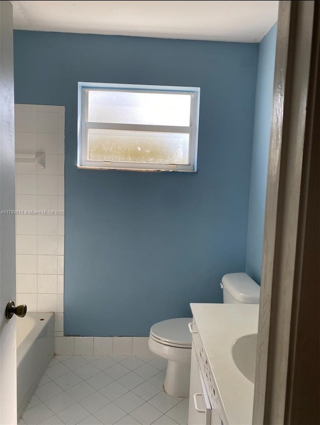 15456 NW 12th Pl, Pembroke Pines, FL 33028 - bathroom featuring tile patterned flooring, toilet, and vanity