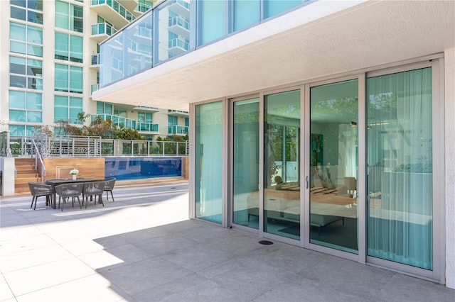 300 Sunny Isles Blvd Unit 4-501, Sunny Isles Beach, FL 33160 - entrance to property with a patio and outdoor dining area