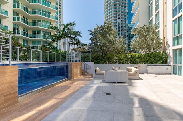 300 Sunny Isles Blvd Unit 4-501, Sunny Isles Beach, FL 33160 - view of pool with an outdoor living space and a patio