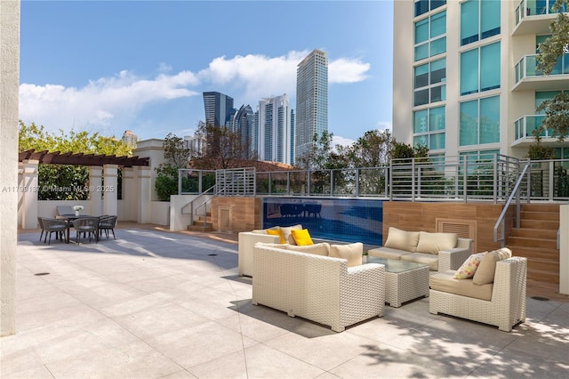 300 Sunny Isles Blvd Unit 4-501, Sunny Isles Beach, FL 33160 - view of patio / terrace with stairway, an outdoor hangout area, and outdoor dining space