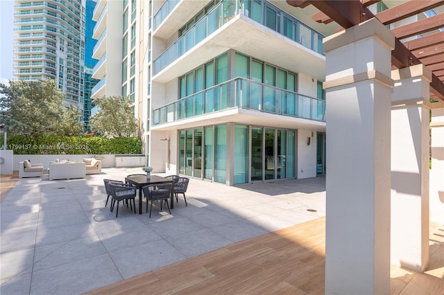 300 Sunny Isles Blvd Unit 4-501, Sunny Isles Beach, FL 33160 - view of patio / terrace with an outdoor hangout area and outdoor dining area