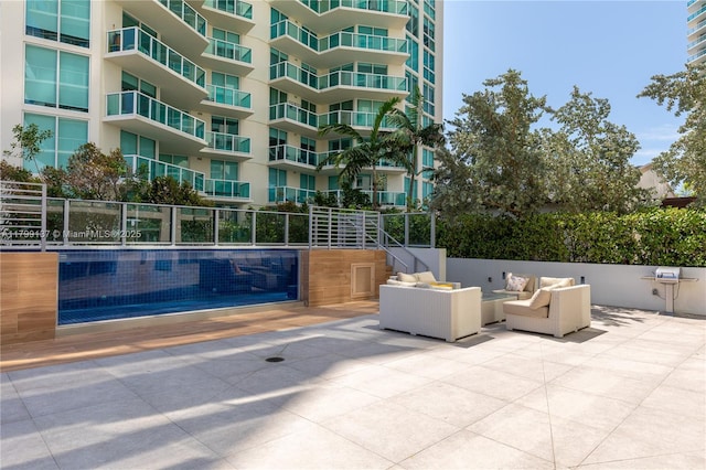300 Sunny Isles Blvd Unit 4-501, Sunny Isles Beach, FL 33160 - view of patio featuring an outdoor hangout area