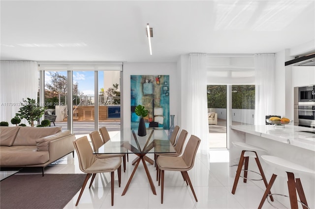 300 Sunny Isles Blvd Unit 4-501, Sunny Isles Beach, FL 33160 - dining area featuring healthy amount of natural light and light tile patterned floors