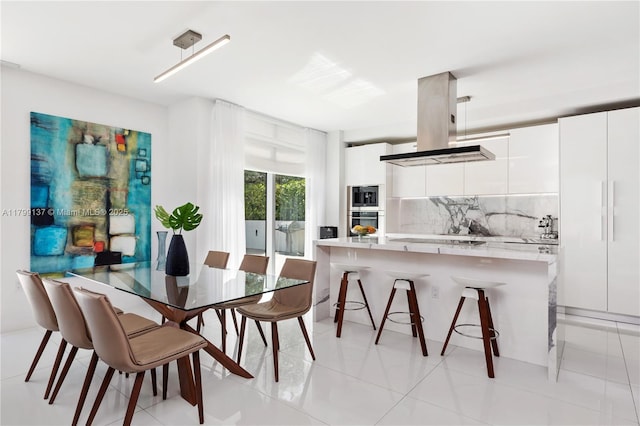 300 Sunny Isles Blvd Unit 4-501, Sunny Isles Beach, FL 33160 - dining space with light tile patterned floors