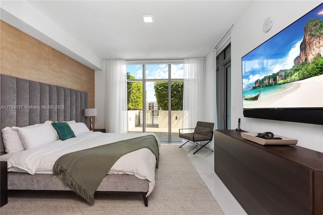 300 Sunny Isles Blvd Unit 4-501, Sunny Isles Beach, FL 33160 - bedroom featuring access to outside, light colored carpet, light tile patterned flooring, and floor to ceiling windows