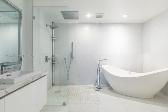 300 Sunny Isles Blvd Unit 4-501, Sunny Isles Beach, FL 33160 - full bath with walk in shower, a soaking tub, vanity, tile patterned flooring, and recessed lighting