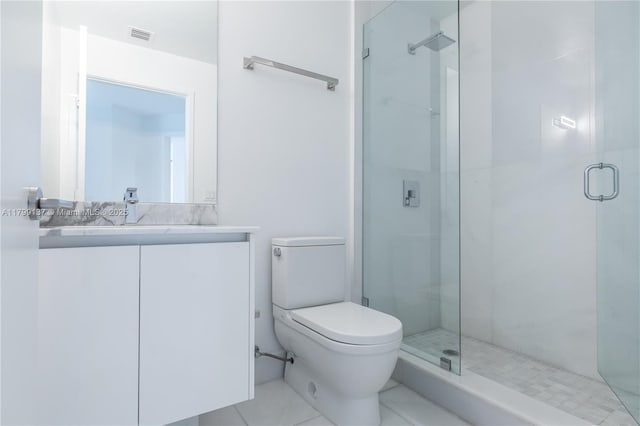 300 Sunny Isles Blvd Unit 4-501, Sunny Isles Beach, FL 33160 - bathroom featuring toilet, a shower stall, vanity, and tile patterned floors