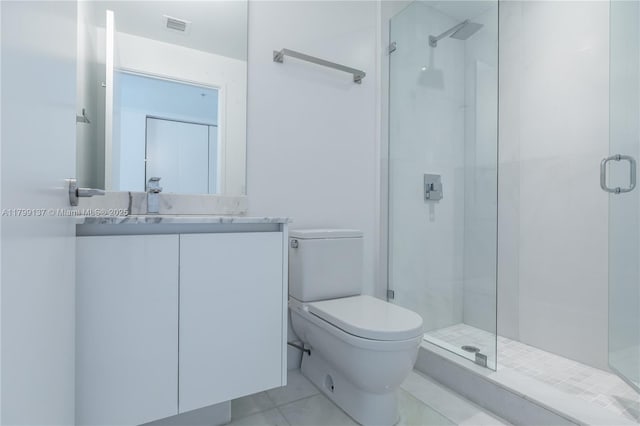 300 Sunny Isles Blvd Unit 4-501, Sunny Isles Beach, FL 33160 - bathroom featuring toilet, a shower stall, vanity, and tile patterned flooring