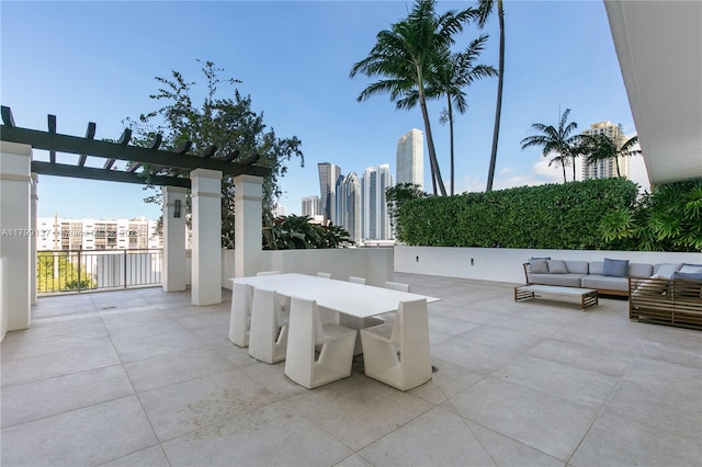 300 Sunny Isles Blvd Unit 4-501, Sunny Isles Beach, FL 33160 - view of patio / terrace featuring an outdoor living space, a pergola, outdoor dining area, and a skyline view