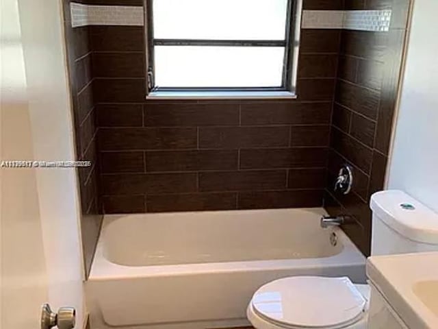 3361 NW 85th Ave Unit 201, Coral Springs, FL 33065 - bathroom featuring toilet, vanity, and  shower combination