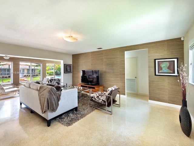 10643 NE 10th Pl, Miami Shores, FL 33138 - living room with baseboards and dark speckled floor