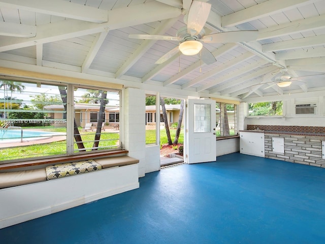 10643 NE 10th Pl, Miami Shores, FL 33138 - unfurnished sunroom with a ceiling fan and a wall mounted AC