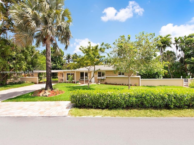 10643 NE 10th Pl, Miami Shores, FL 33138 - view of front of property featuring decorative driveway