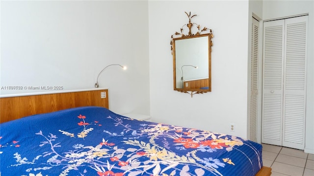 1051 Euclid Ave Unit 208, Miami Beach, FL 33139 - bedroom with tile patterned flooring and a closet