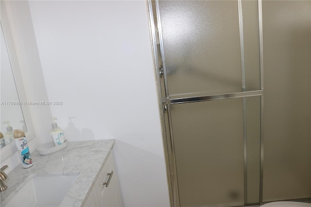 7891 N Sunrise Lakes Dr Unit 101, Sunrise, FL 33322 - full bathroom with a stall shower and vanity