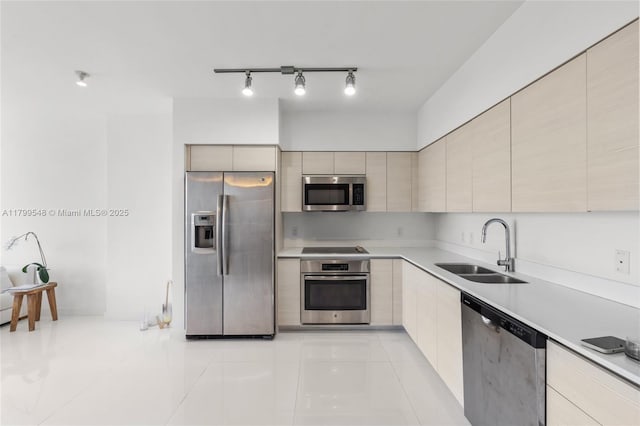 4250 Biscayne Blvd Unit 1112, Miami, FL 33137 - kitchen featuring stainless steel appliances, a sink, modern cabinets, light countertops, and light tile patterned flooring