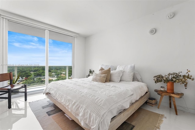 4250 Biscayne Blvd Unit 1112, Miami, FL 33137 - bedroom featuring floor to ceiling windows
