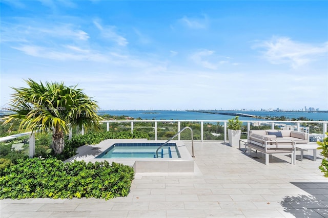 4250 Biscayne Blvd Unit 1112, Miami, FL 33137 - view of pool with a water view, a hot tub, outdoor lounge area, and a patio area