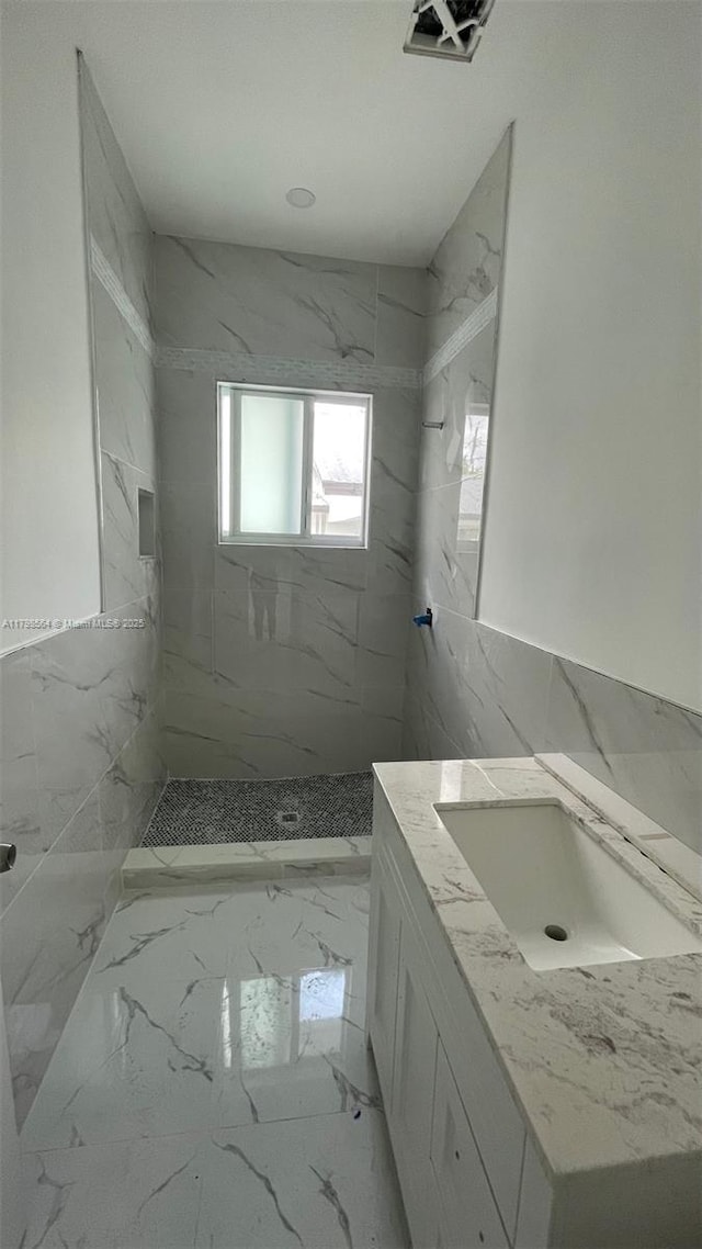 640 SW 12th Ave, Homestead, FL 33030 - bathroom with a marble finish shower, vanity, and marble finish floors