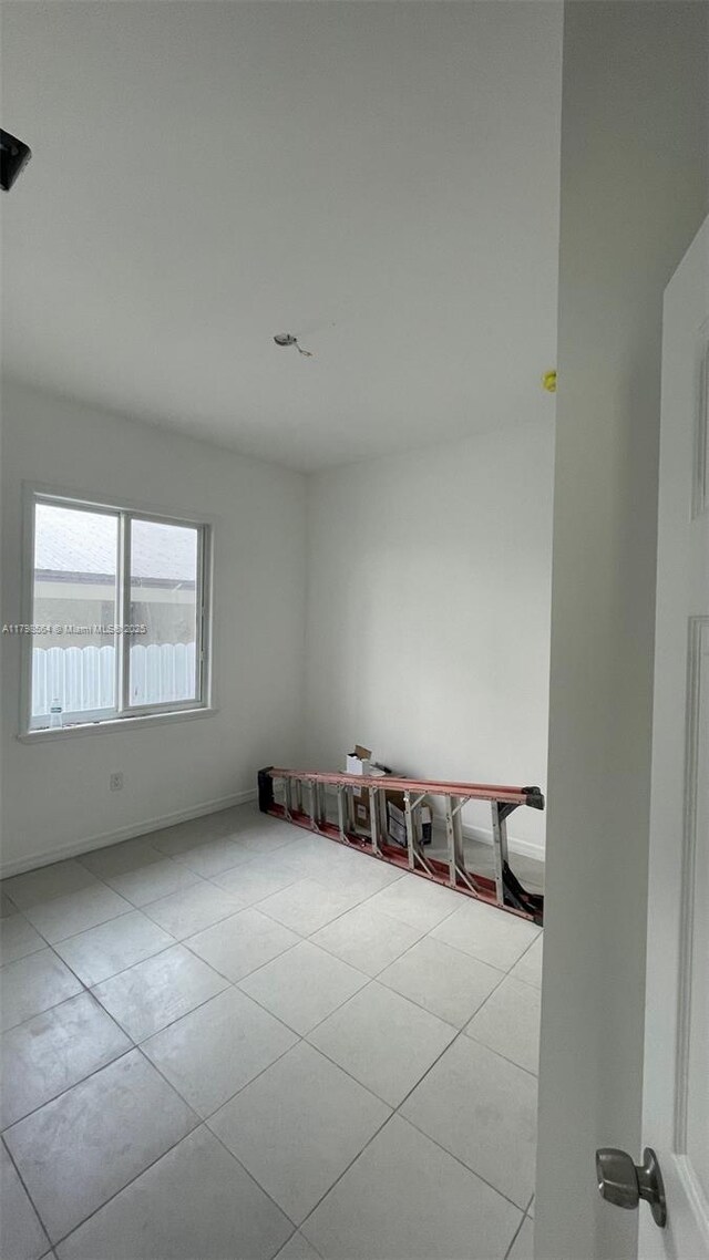 640 SW 12th Ave, Homestead, FL 33030 - unfurnished room with tile patterned flooring and baseboards