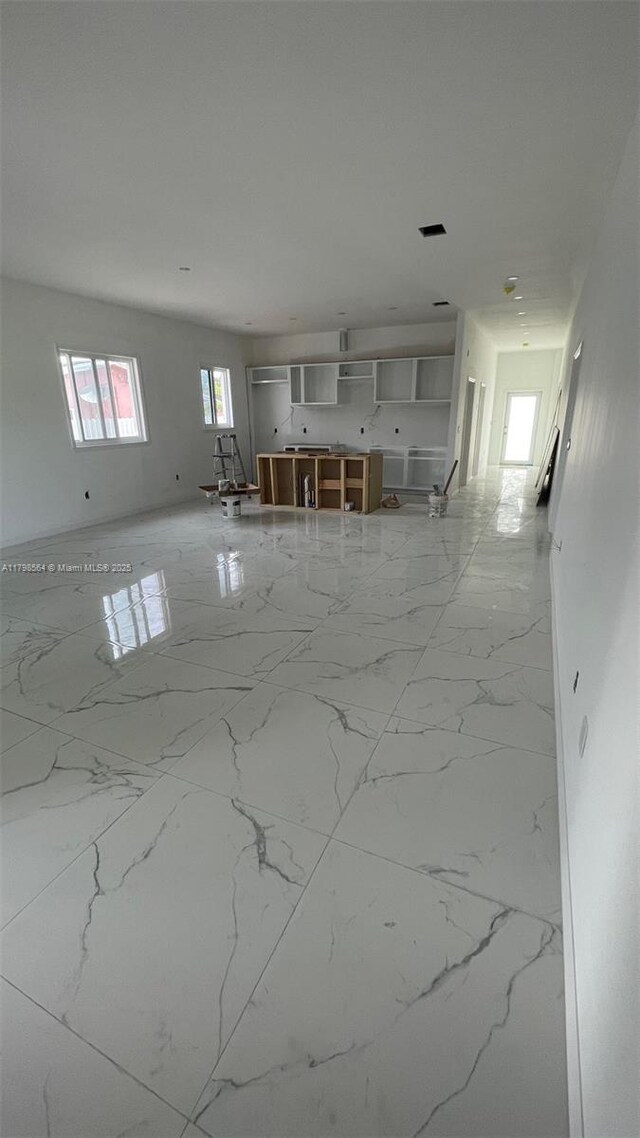 640 SW 12th Ave, Homestead, FL 33030 - unfurnished living room with marble finish floors