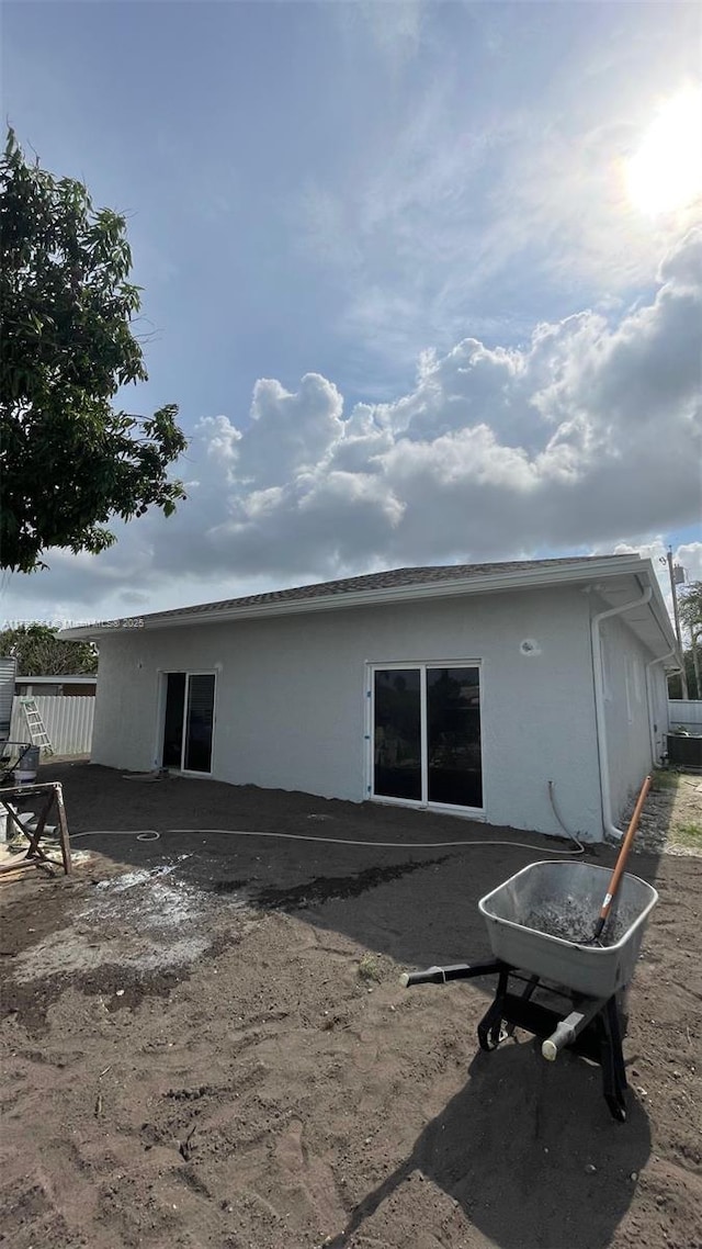 640 SW 12th Ave, Homestead, FL 33030 - rear view of property featuring stucco siding