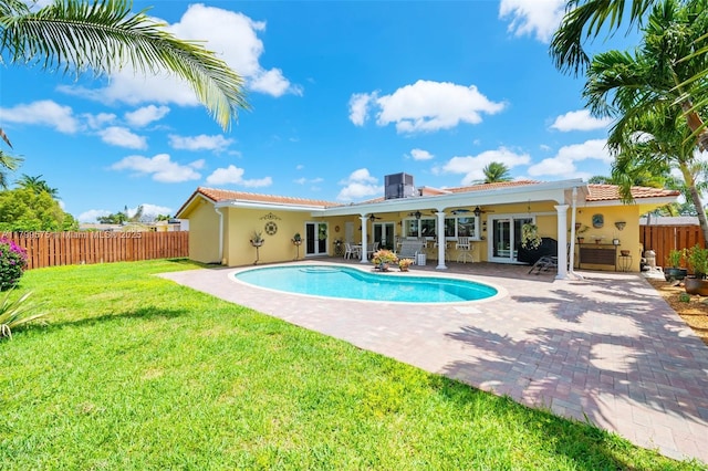 5221 Roosevelt St, Hollywood, FL 33021 - view of swimming pool featuring ceiling fan, a patio, and french doors