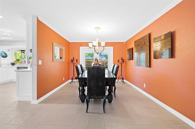 5221 Roosevelt St, Hollywood, FL 33021 - dining space featuring a chandelier, ornamental molding, baseboards, and light tile patterned flooring