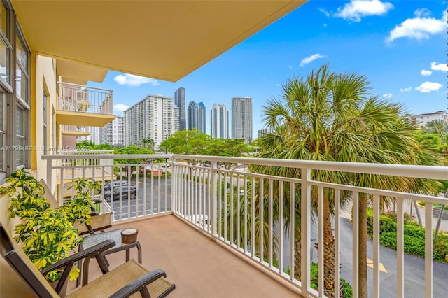 251 174th St Unit 212, Sunny Isles Beach, FL 33160 - balcony with a skyline view and a water view
