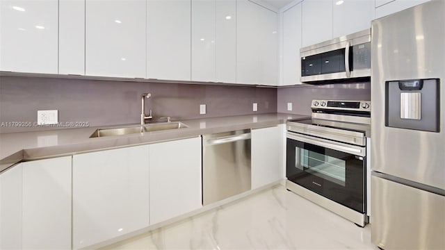 3625 N Country Club Dr Unit 609, Aventura, FL 33180 - kitchen with appliances with stainless steel finishes, modern cabinets, and a sink