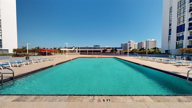 3625 N Country Club Dr Unit 609, Aventura, FL 33180 - community pool featuring a patio area