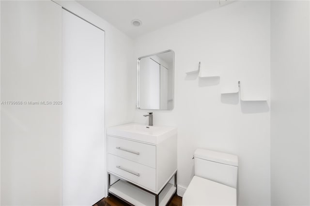 901 Brickell Key Blvd Unit 607, Miami, FL 33131 - bathroom featuring toilet and vanity