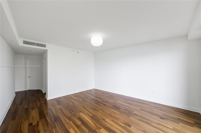 901 Brickell Key Blvd Unit 607, Miami, FL 33131 - unfurnished room featuring wood finished floors and baseboards