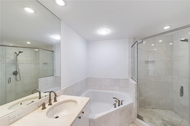 901 Brickell Key Blvd Unit 607, Miami, FL 33131 - full bathroom featuring a bath, a stall shower, vanity, and recessed lighting
